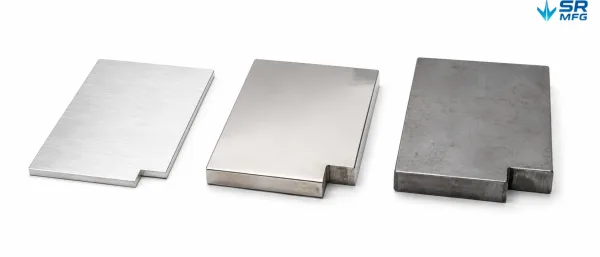 Three EV battery cover material samples — aluminum alloy, stainless steel, and low-carbon steel — showing different surface finishes