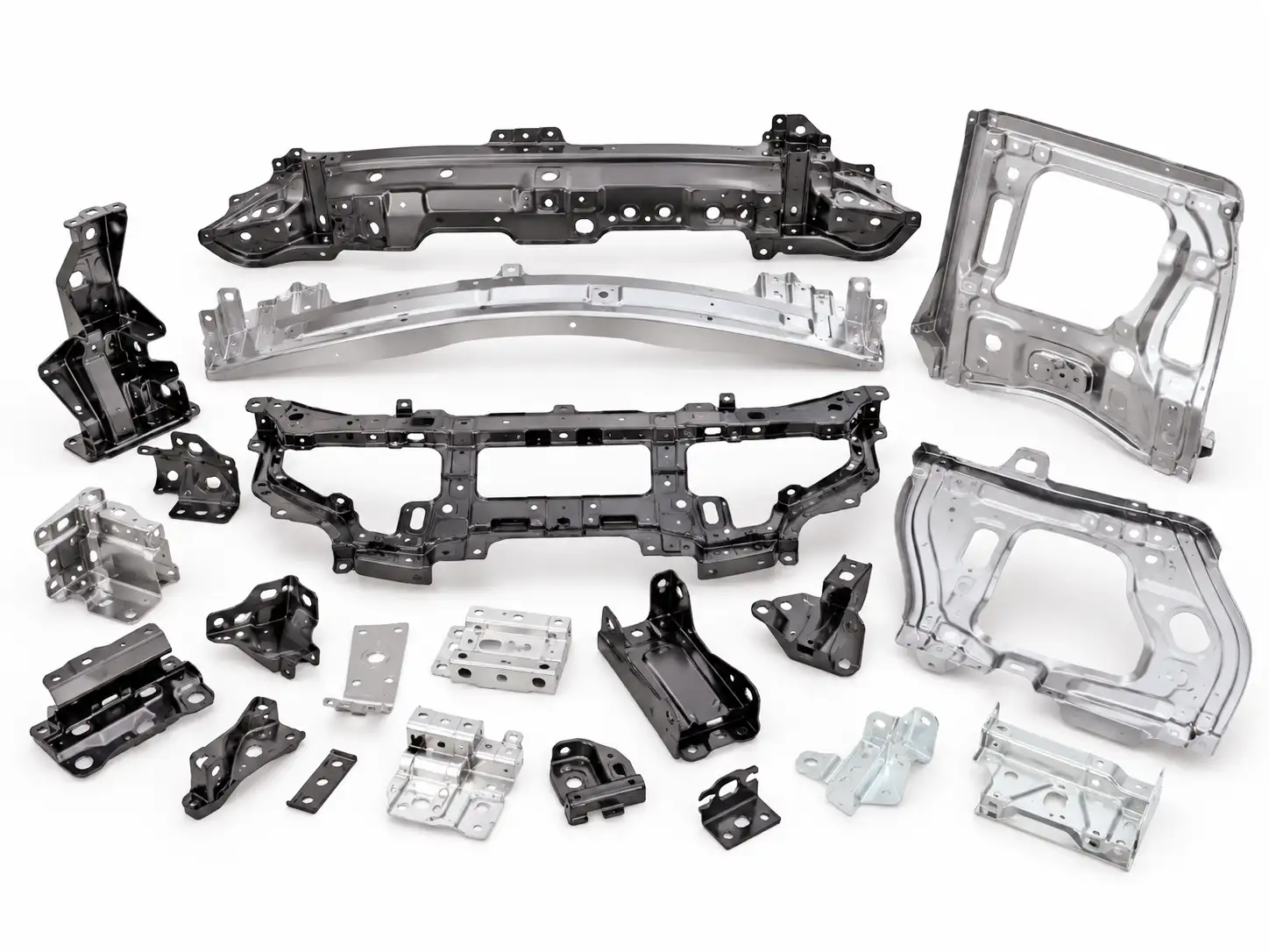 Automotive exterior sheet metal components including bumper brackets, grille frames and door panels